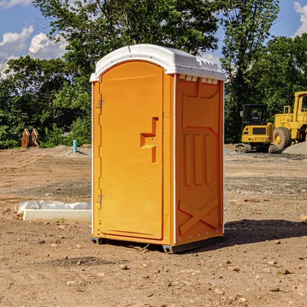 what is the cost difference between standard and deluxe portable restroom rentals in Guilford County